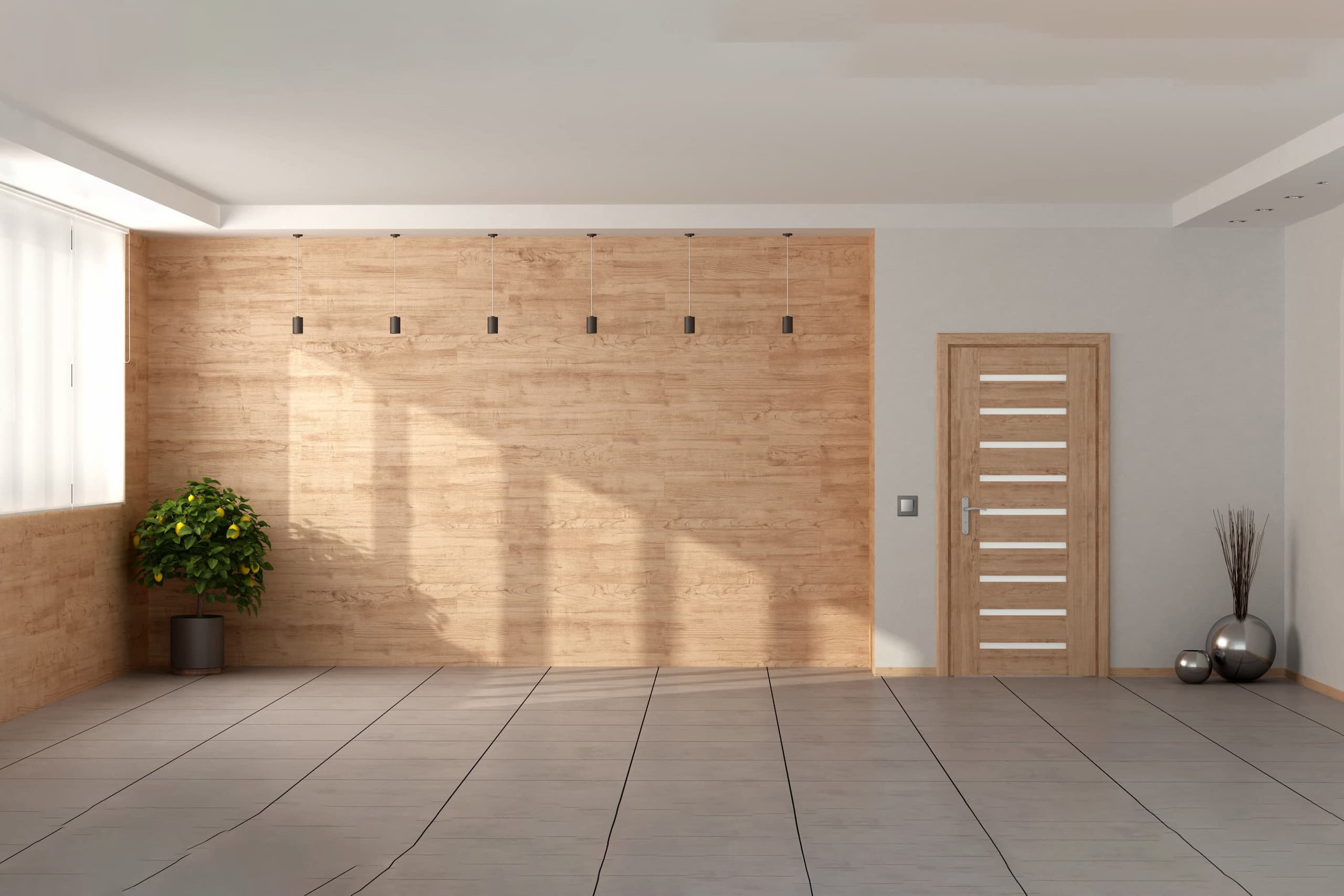 A modern minimalist living room with a wooden accent wall, a stylish wooden door, hanging lights, and decorative plants.